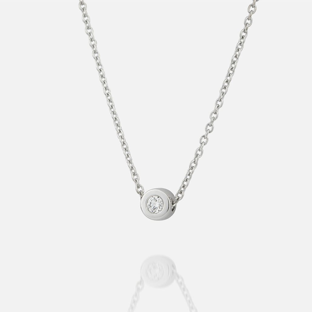 Fio e pendente em ouro branco com diamante | One